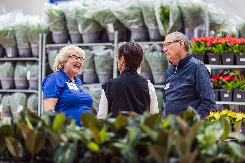 Lisa Sooy warmly greets 2024 ODCS Plant Sale volunteers