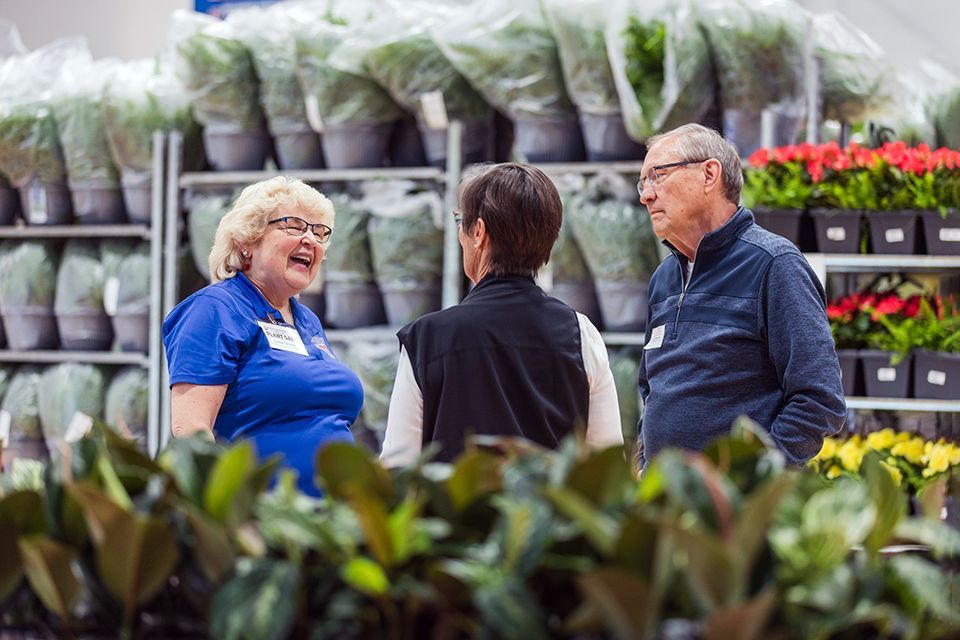 Lisa Sooy warmly greets 2024 ODCS Plant Sale volunteers