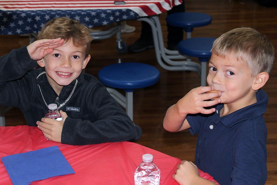 Two ODCS students enjoy a snack break