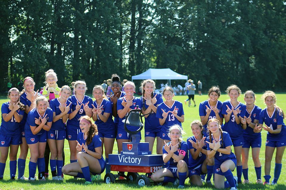 The ODCS girls soccer team celebrates a win.