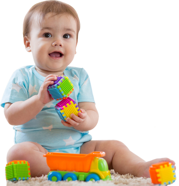 baby boy playing toys in nursery or daycare