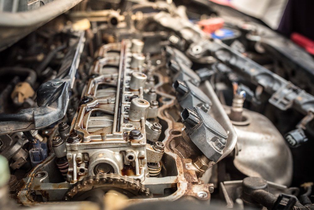 A Close up Of a Car Engine with The Hood Open — Emu Park Automotive and Tyre Service in Emu Park, QLD