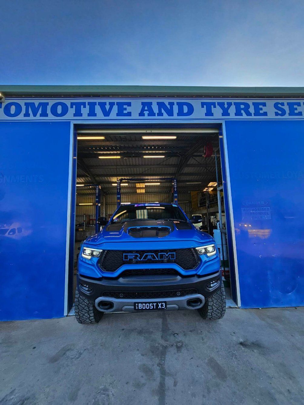 Blue Truck Is Parked in Front of A Building — Emu Park Automotive and Tyre Service in Emu Park, QLD