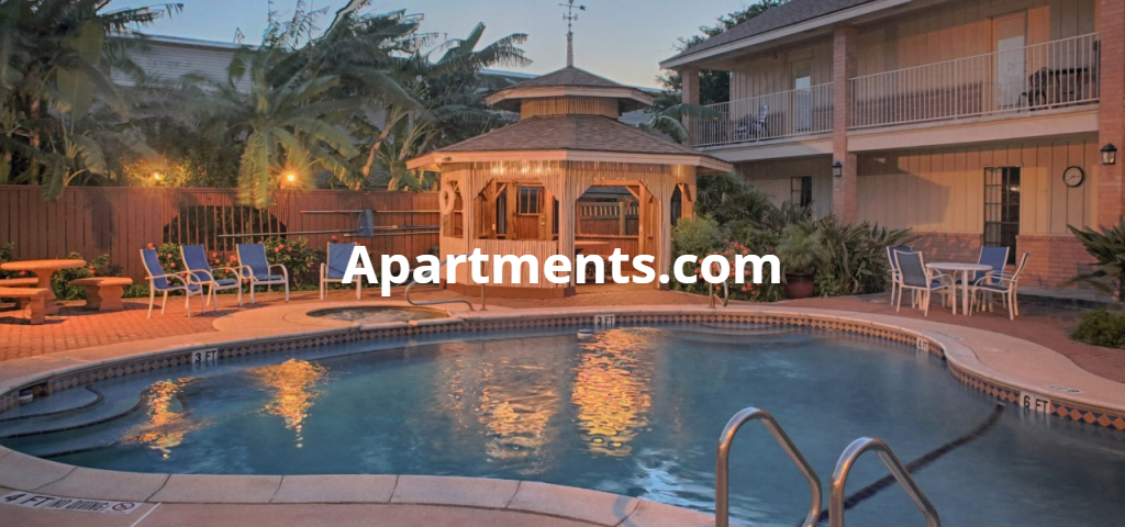 A brick building with a sign that says pure river apartments