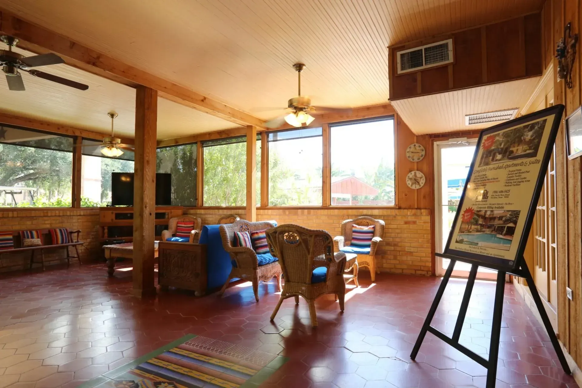 A man is plastering a wall with a trowel.