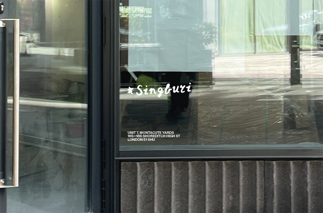 Singburi restaurant window signage