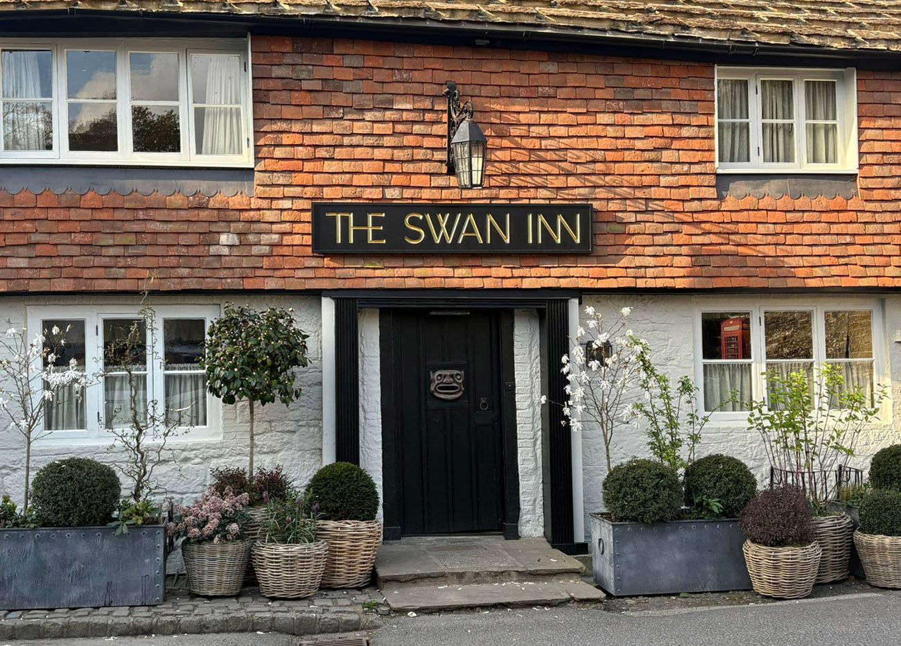 The Swan Inn character signage
