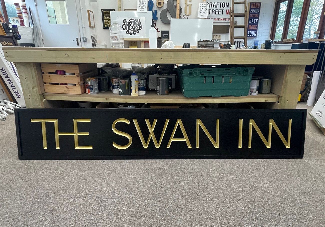 The Swan Inn sign preparation
