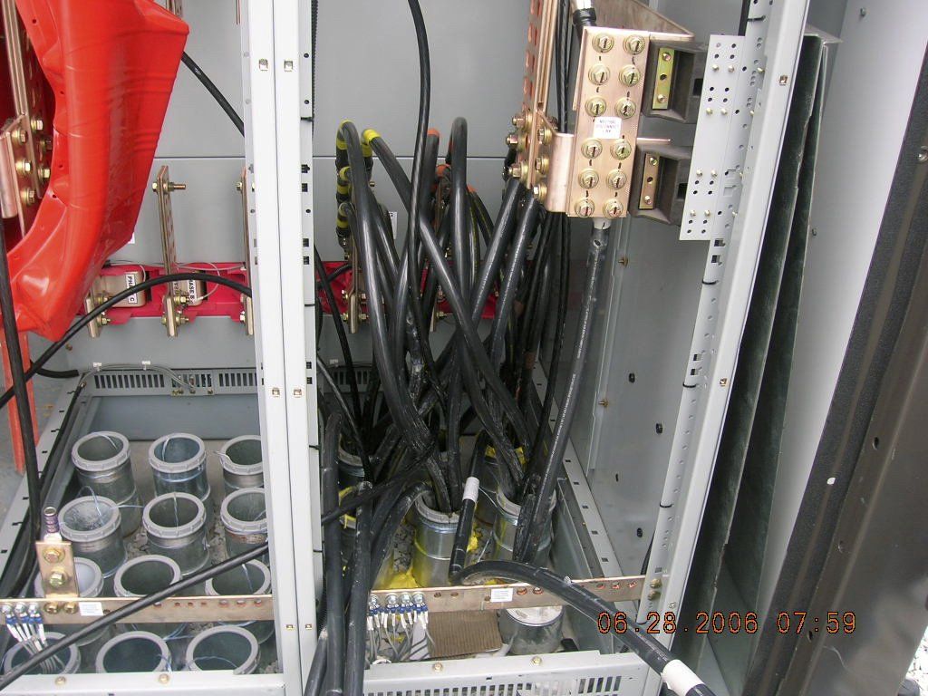 A bunch of wires are connected to a metal box