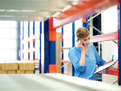 Huntsville Logistics — Woman Checking Inventory in Warehouse in Huntsville, AL