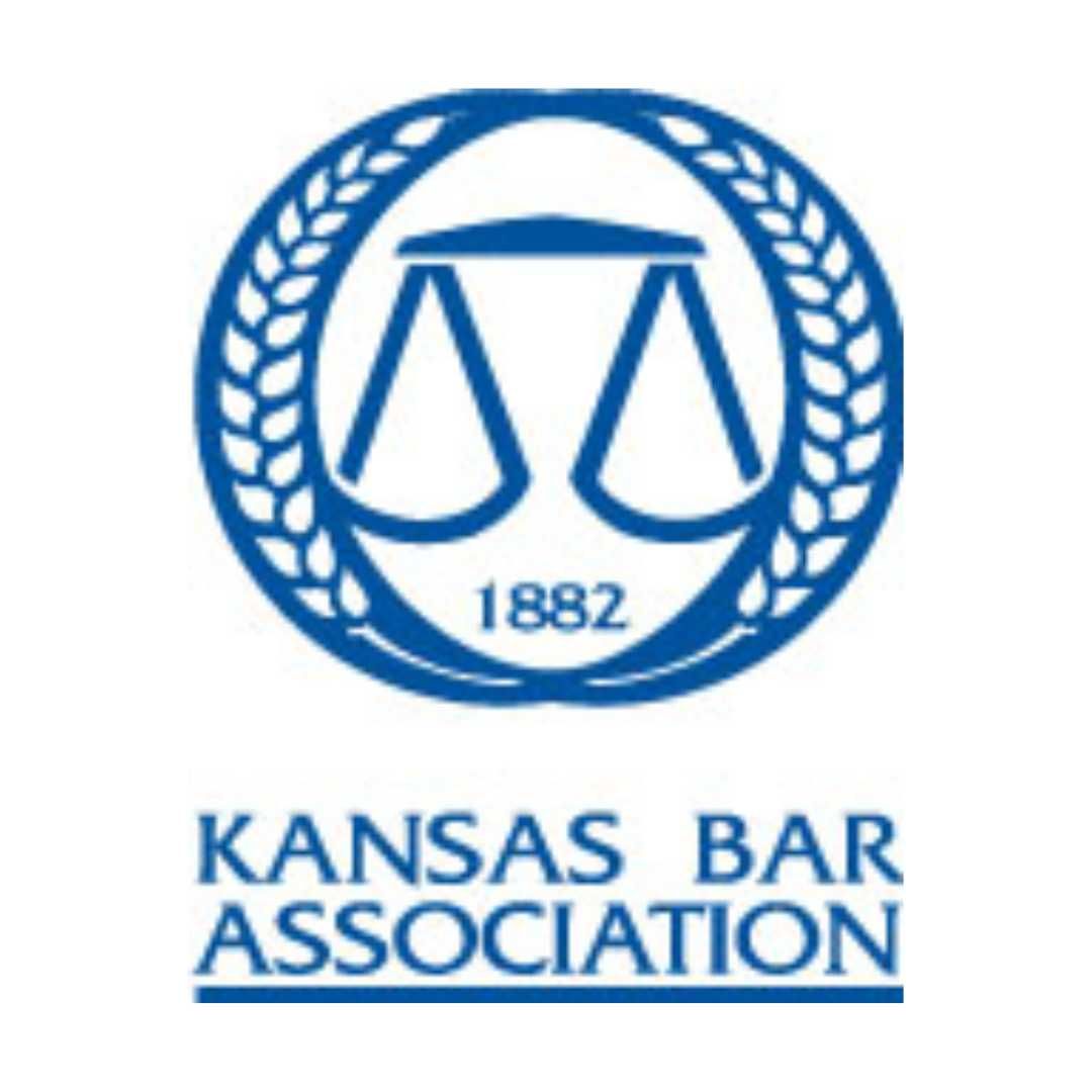 A logo for the kansas bar association with scales of justice