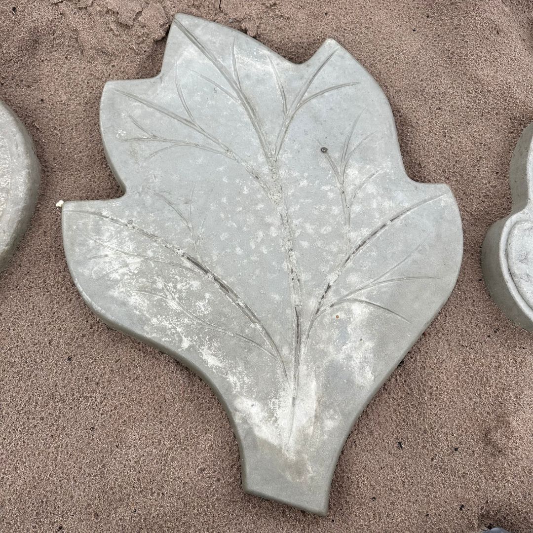 Leaf-Shaped Gray Concrete Paver on Sand, With Etched Leaf Veins — Concrete Sleepers NSW in Central Coast, NSW
