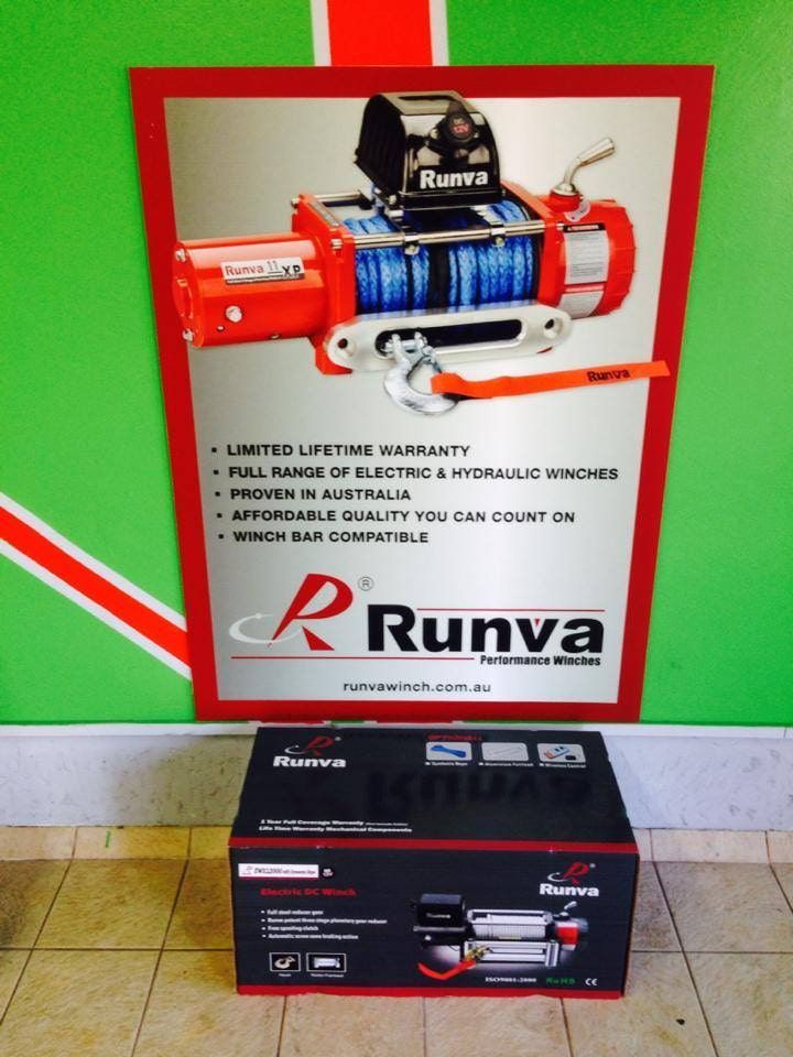 A Runva Winch Is On Display In Front Of A Green Wall — Staunch Window Tinting In South Lismore, NSW