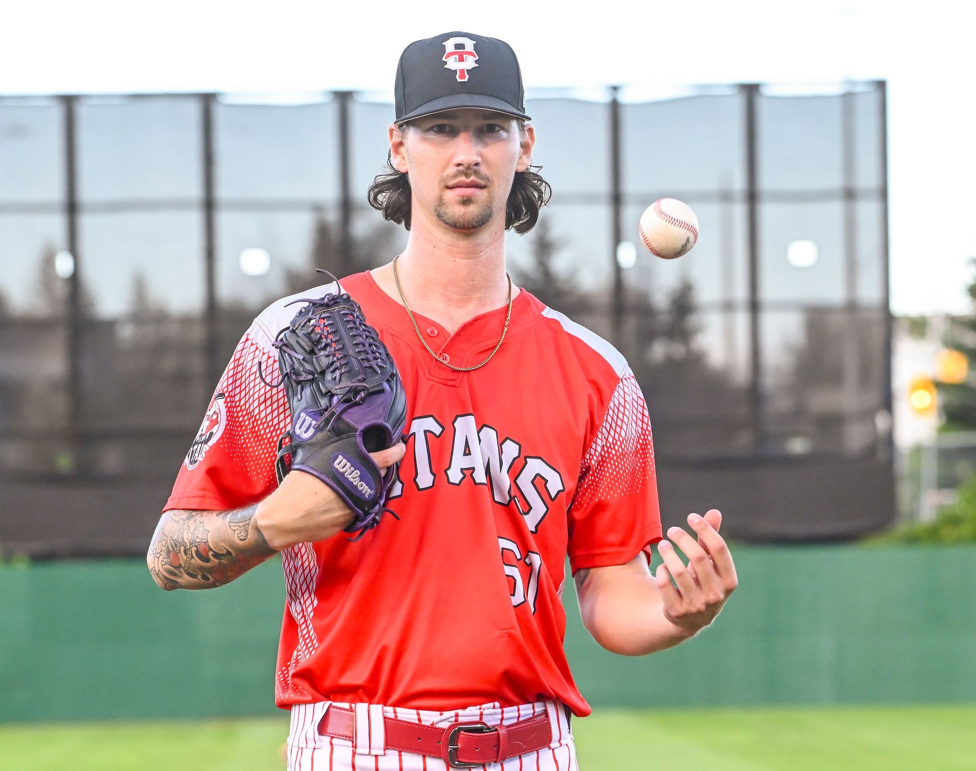 Larson expressing his heritage through ink, baseball