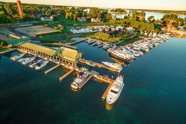 An aerial view of a marina with boats docked.
