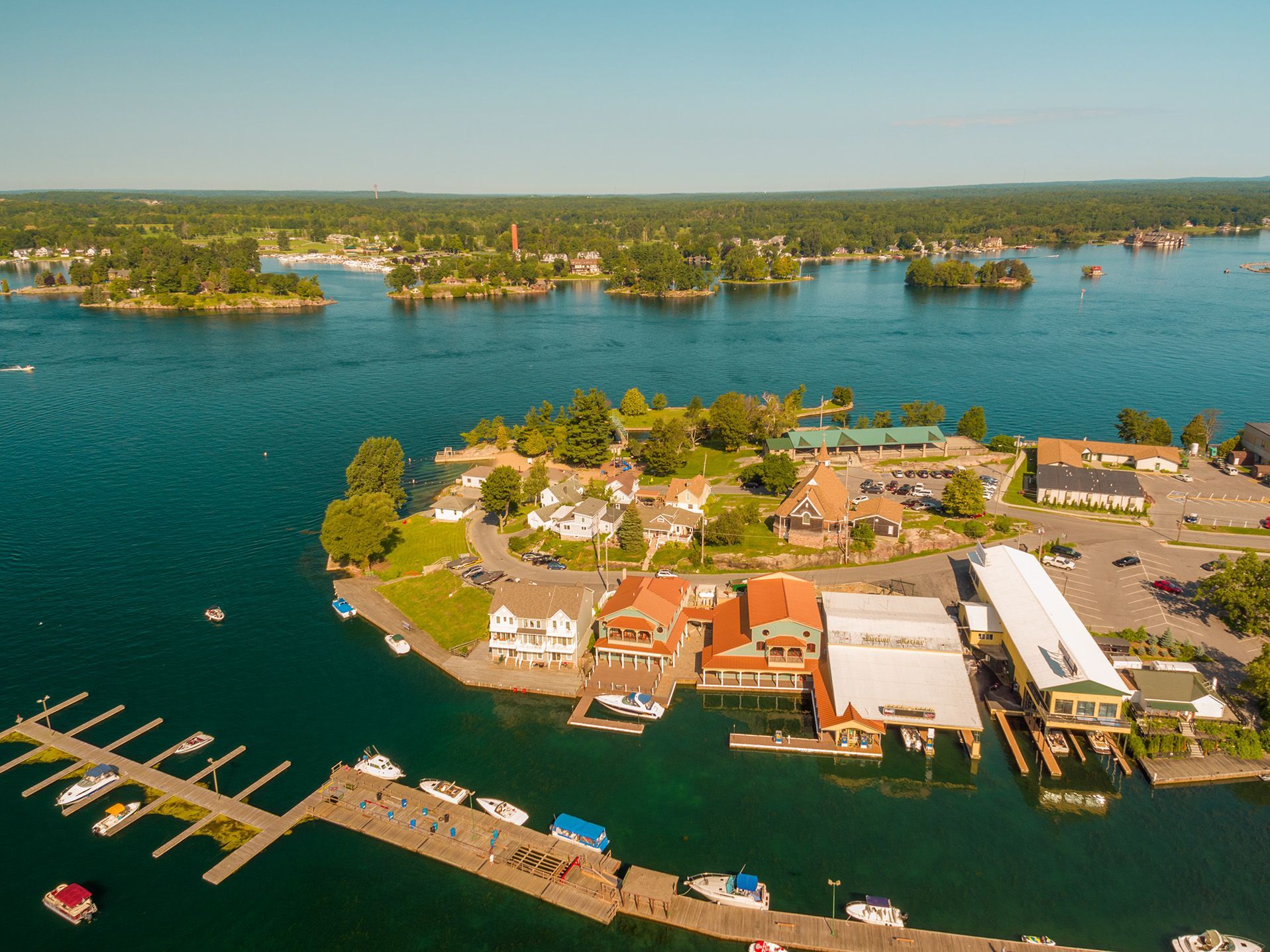 An aerial view of a small island in the middle of a large body of water.