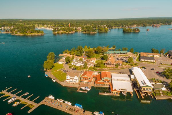 An aerial view of a small island in the middle of a large body of water.