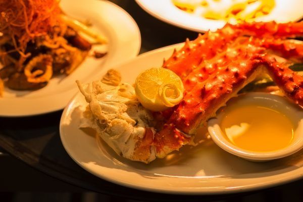 A close up of a plate crab, on a table.