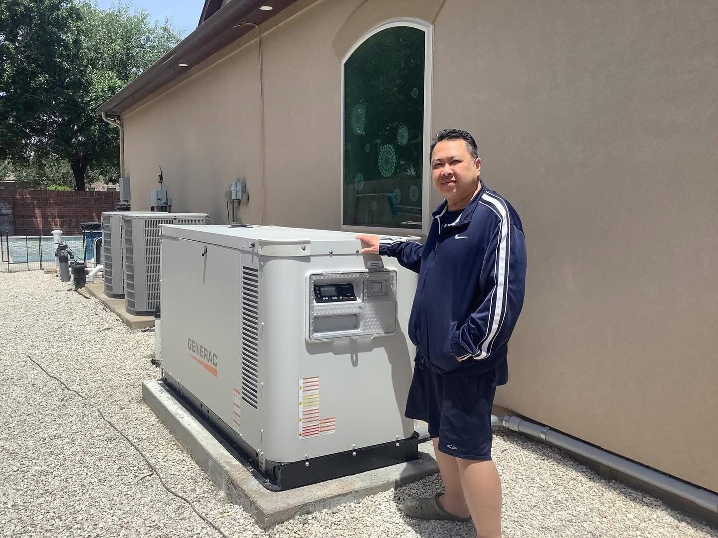 Man stands next to a large, gray generator. Outdoors near building, with pool in the background.