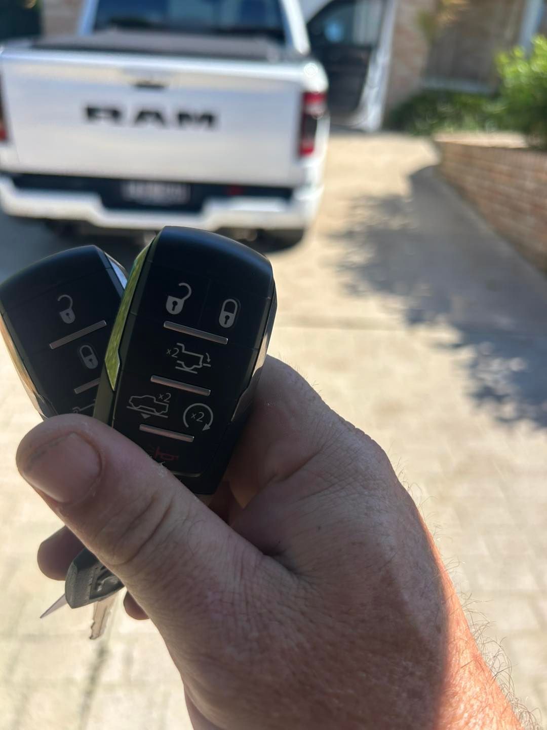 Hand Holding Two Car Keys — All Pro Locksmiths In Port Macquarie, NSW