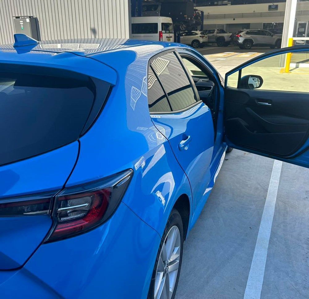 Blue Toyota Hatchback With Open Door — All Pro Locksmiths In Port Macquarie, NSW