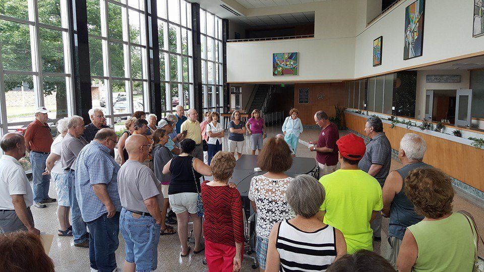 People Gathering Together — Utica, NY — Hage & Hage LLC