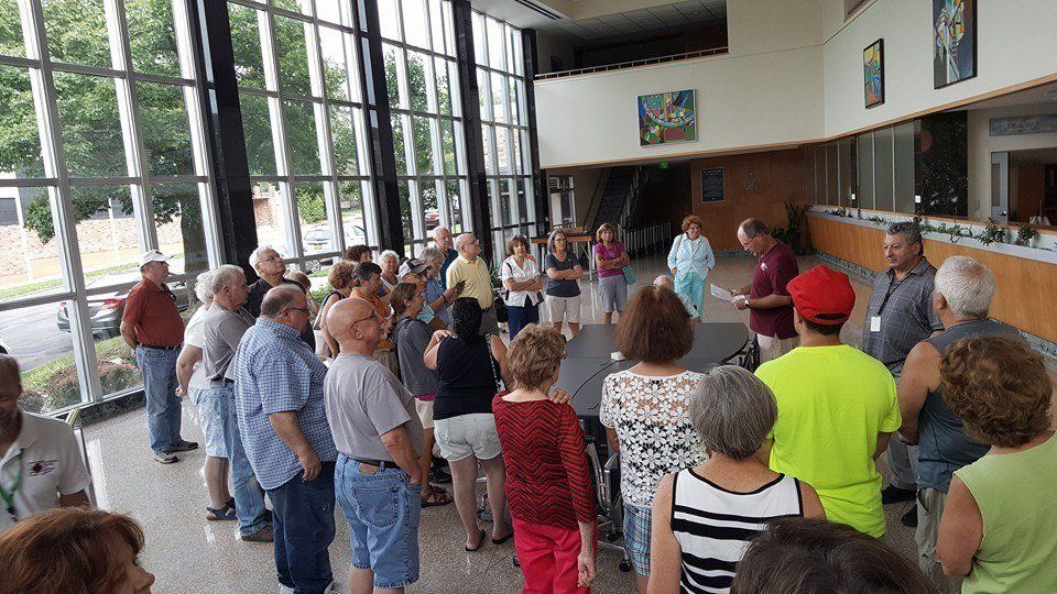 People Listening to the Speaker — Utica, NY — Hage & Hage LLC