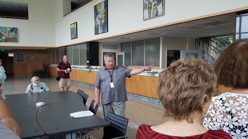 Senior Man Discussing in Front — Utica, NY — Hage & Hage LLC