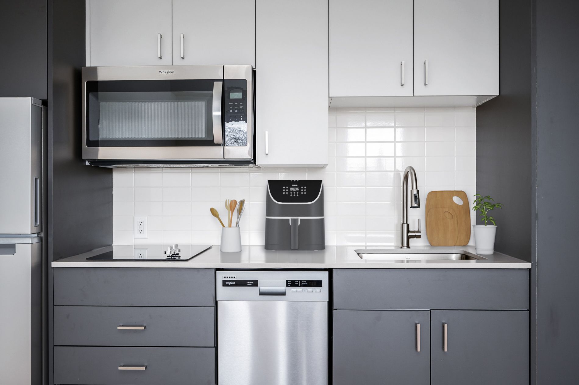 Modern kitchen with white and gray cabinets, stainless steel appliances, and a microwave.