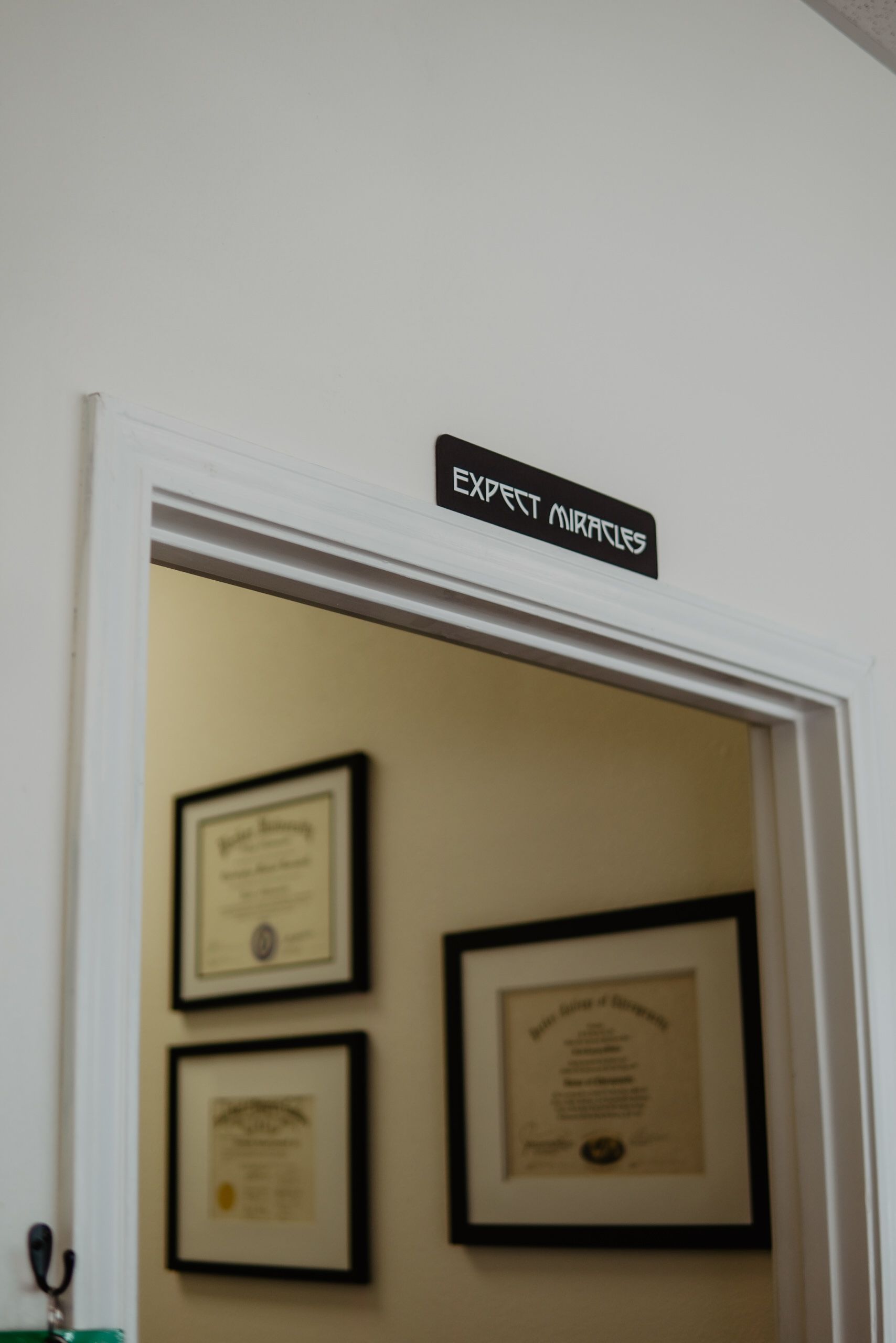 A doorway with a sign that says ' expert nurse ' on it