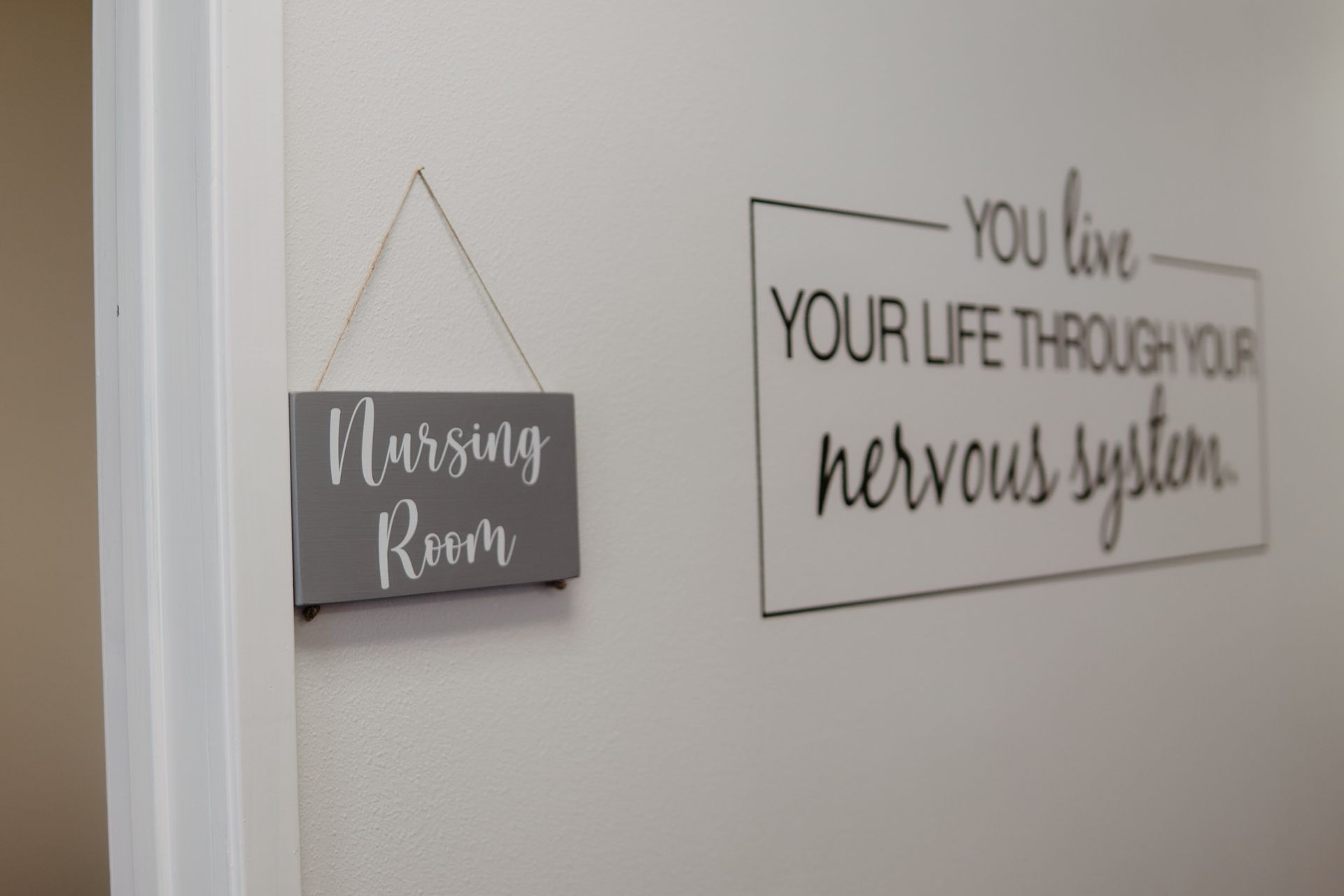 A sign on a wall that says you live your life through your nervous system