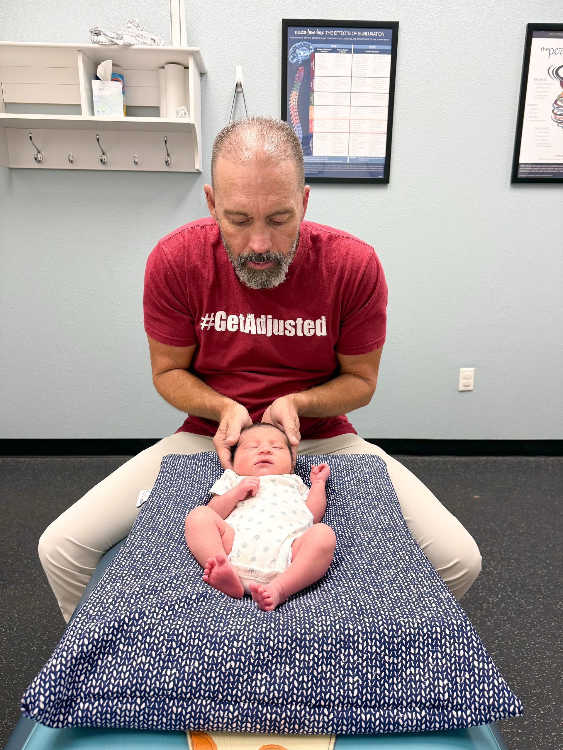 A man is giving a woman a head massage.