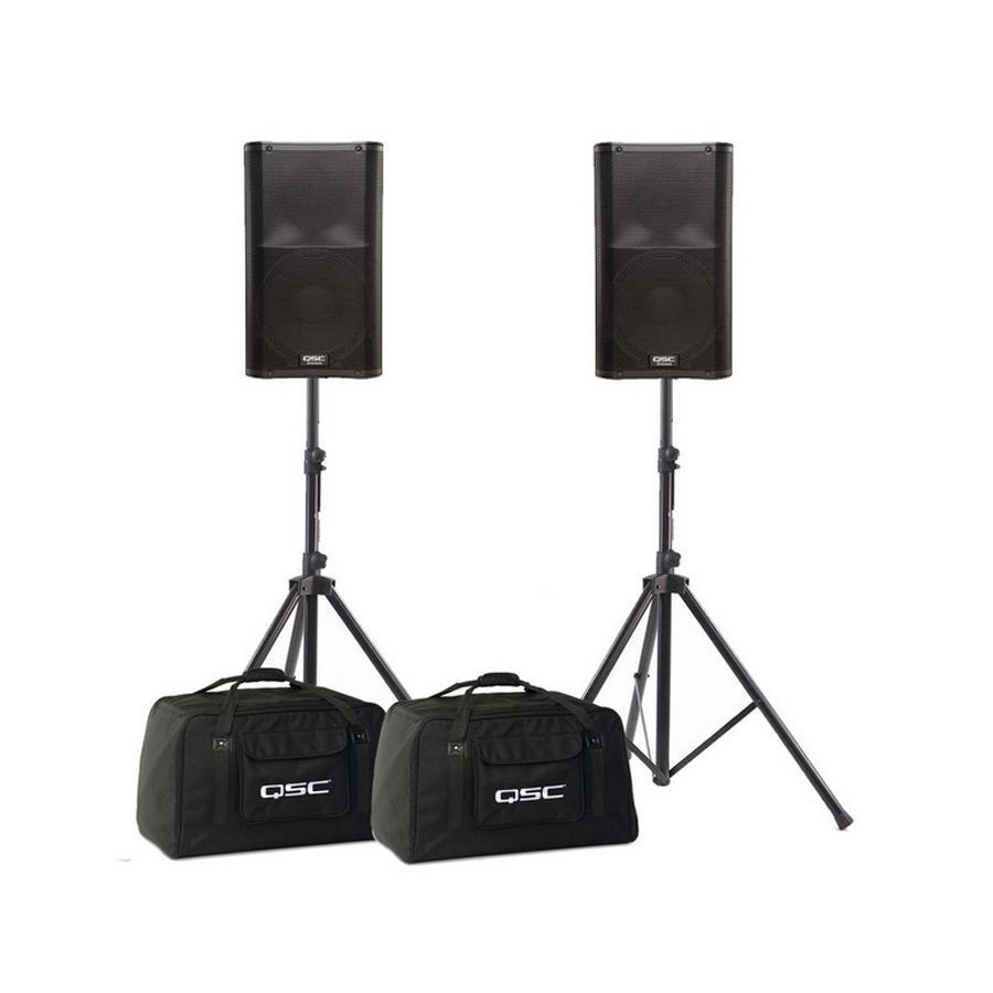 Two black speakers on stands, with black bags.