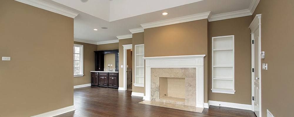 There is a fireplace in the middle of the room.