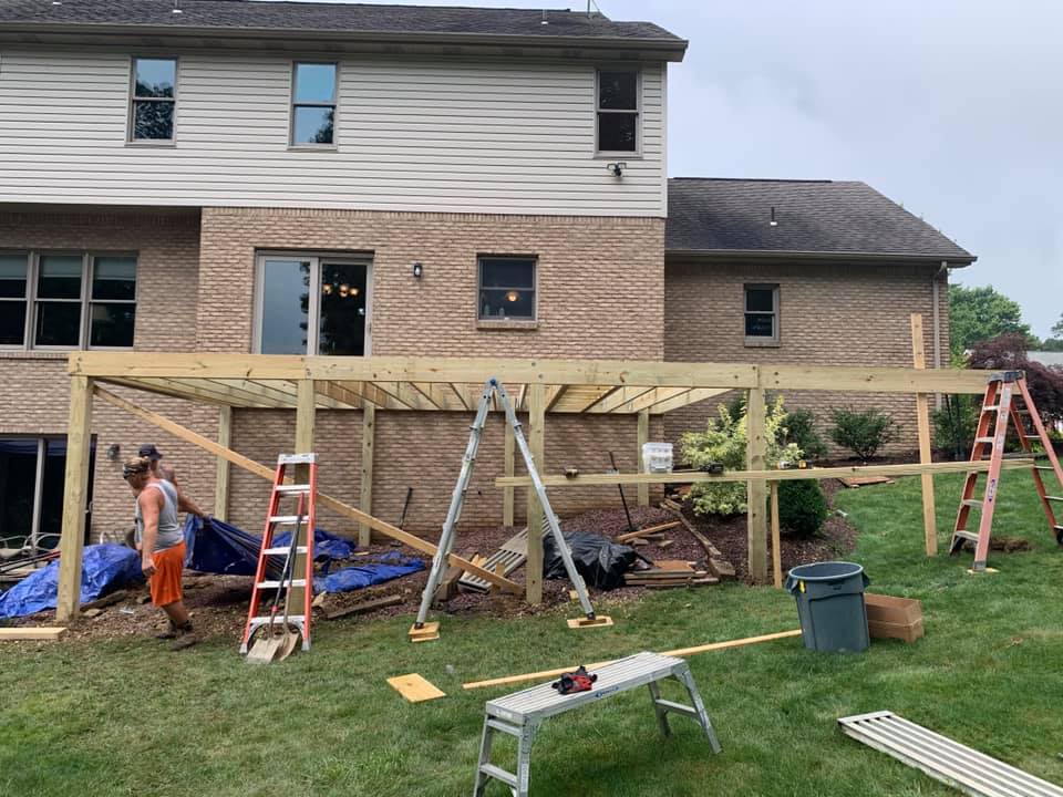 Two Men Working On A Deck Construction — Greensburg, PA — Pevarnik Construction