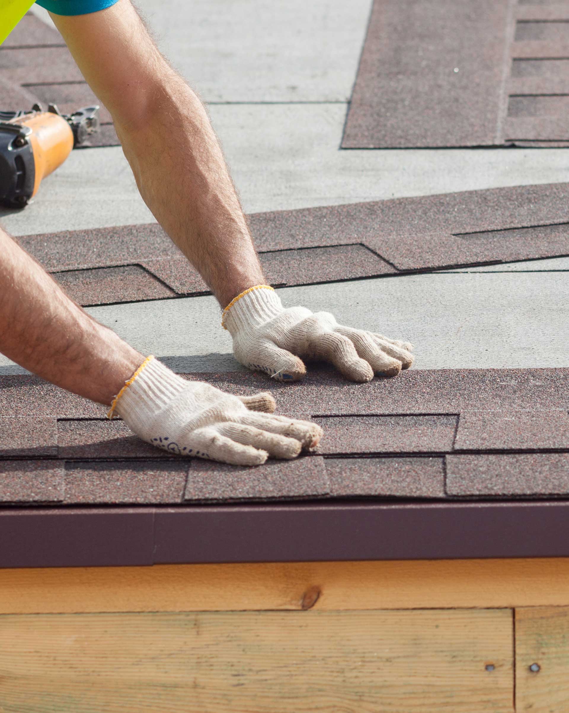 Worker Installing Shingle Roof — Powells Point, NC — Coastal Roofing & Siding Inc