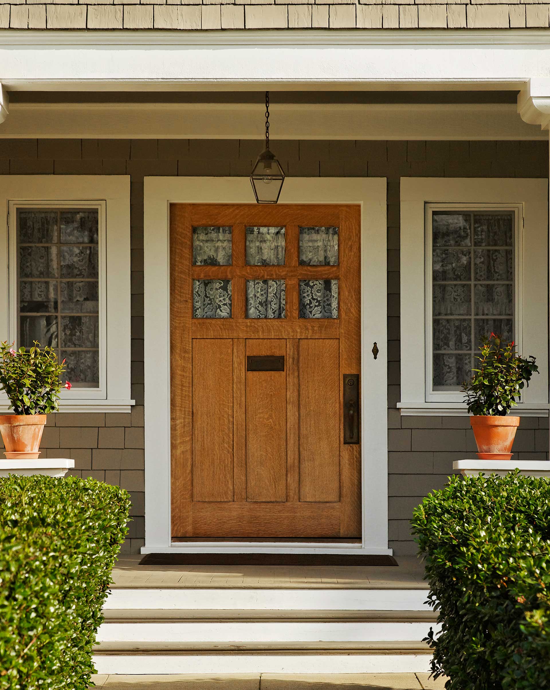 Wooden Front Door — Powells Point, NC — Coastal Roofing & Siding Inc