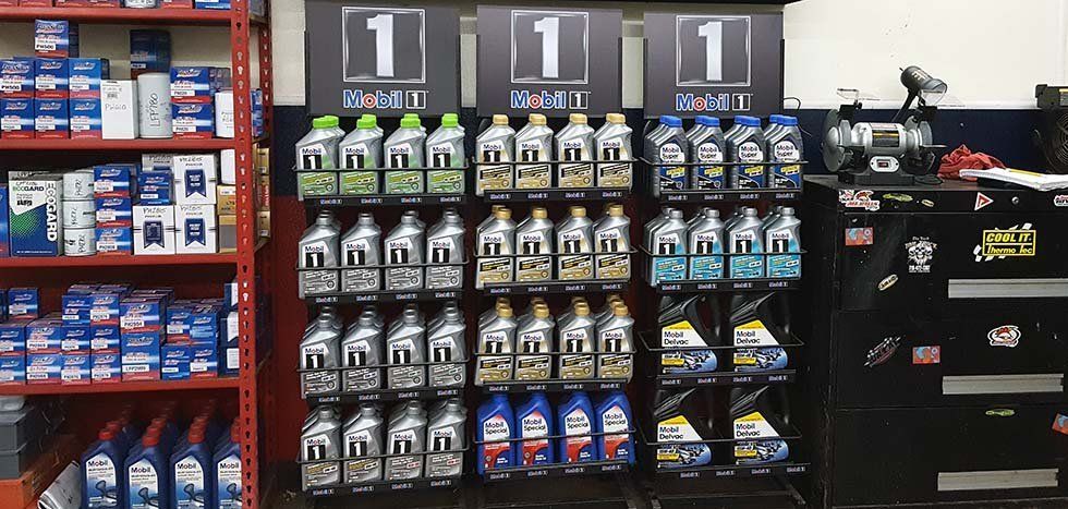 A store filled with lots of bottles of oil