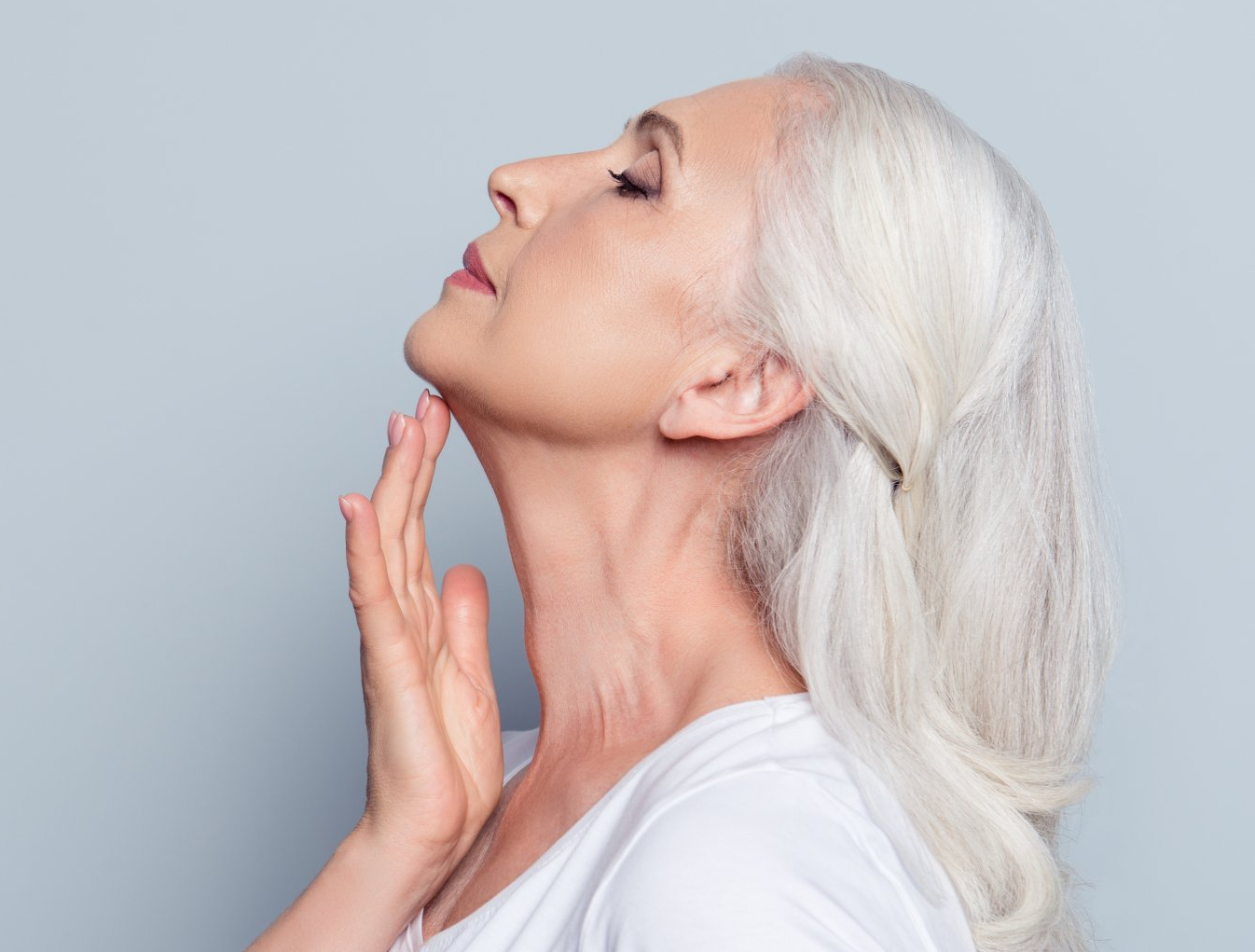 a senior woman who's just gotten her chin done