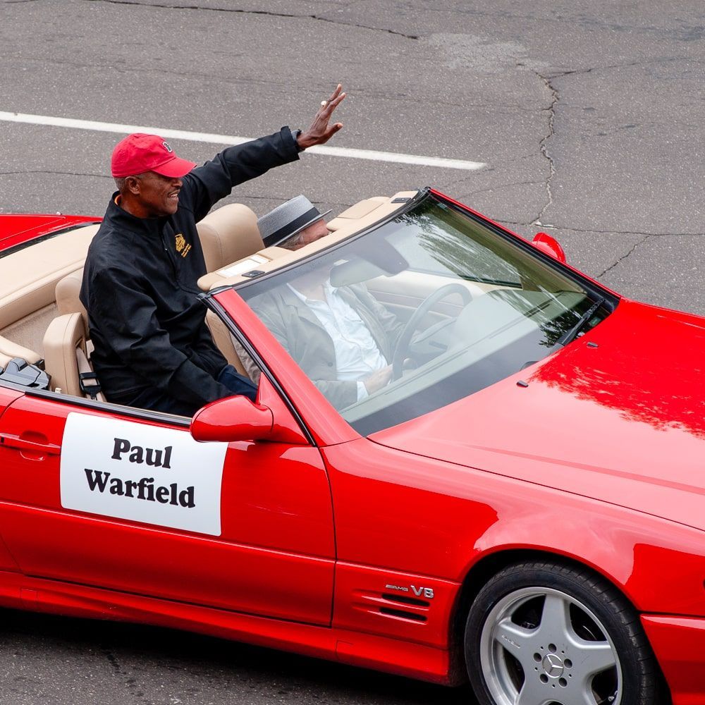 Paul Warfield, waving at parade in Warren, Ohio
