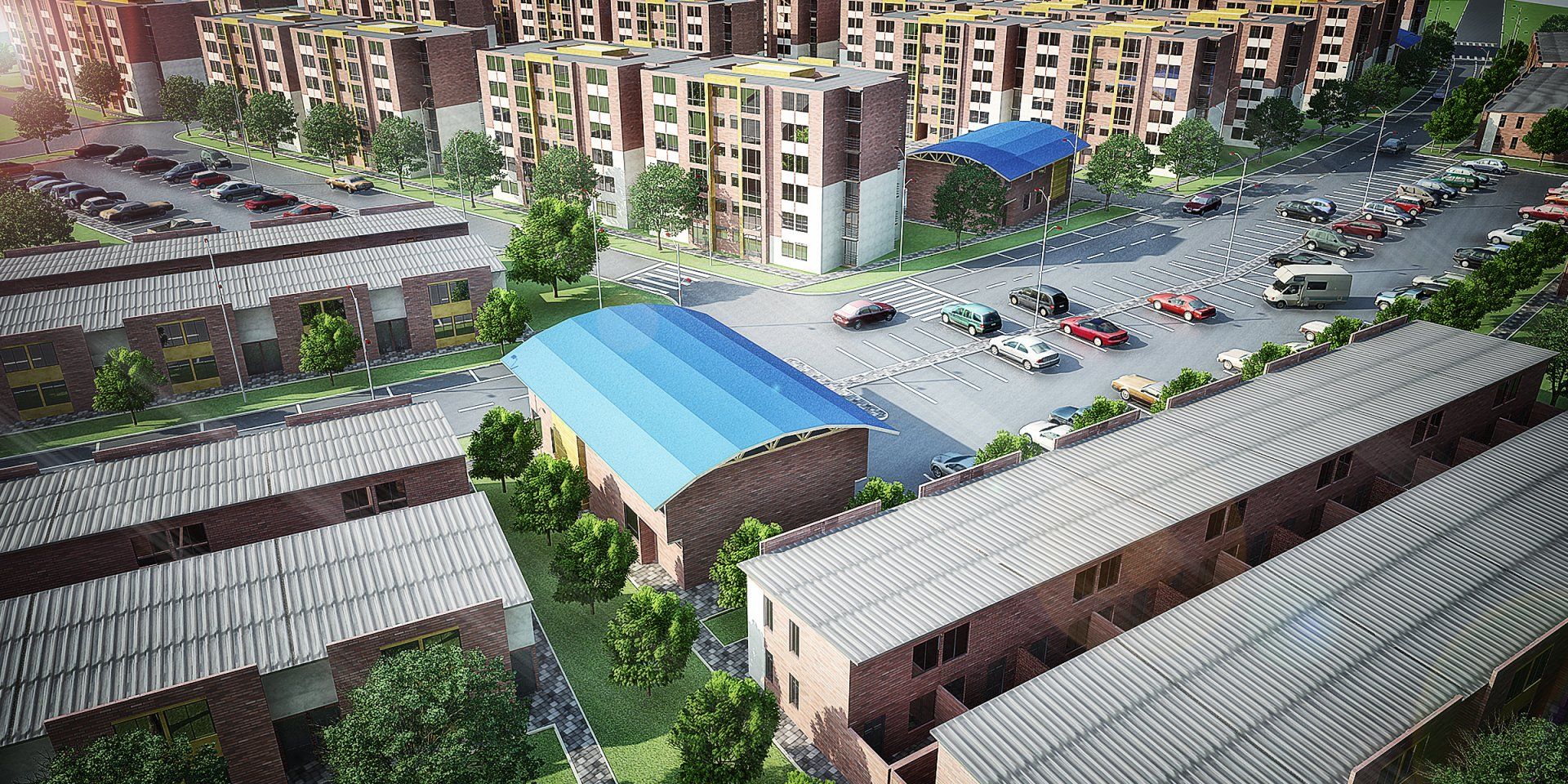 Una vista aérea de una ciudad con muchos edificios y autos estacionados frente a ellos.