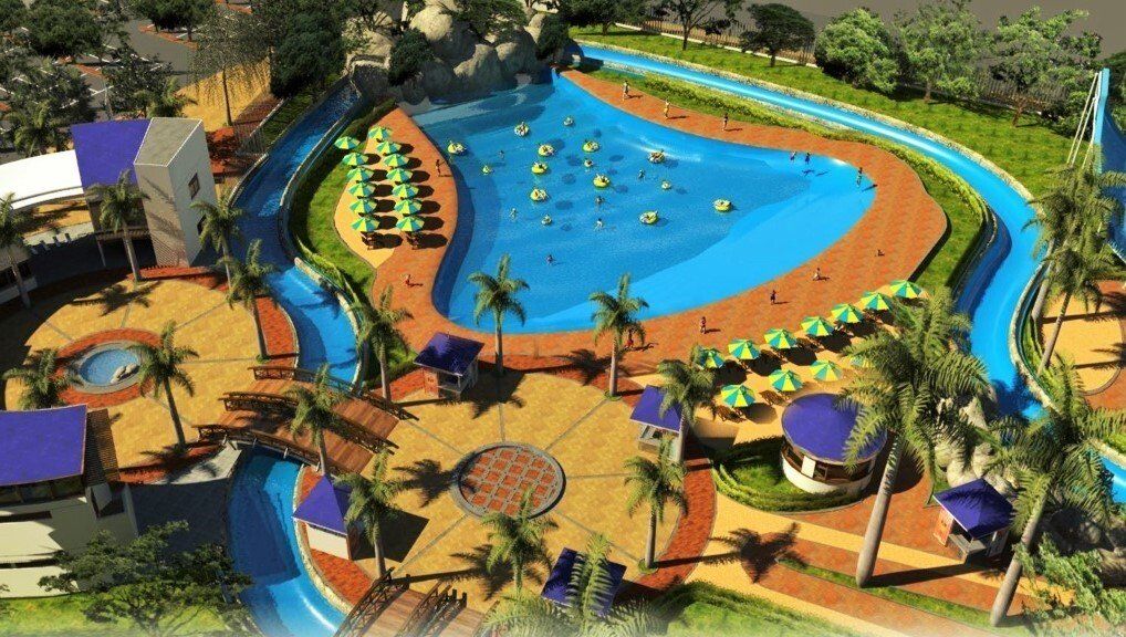 Una vista aérea de un parque acuático con una gran piscina