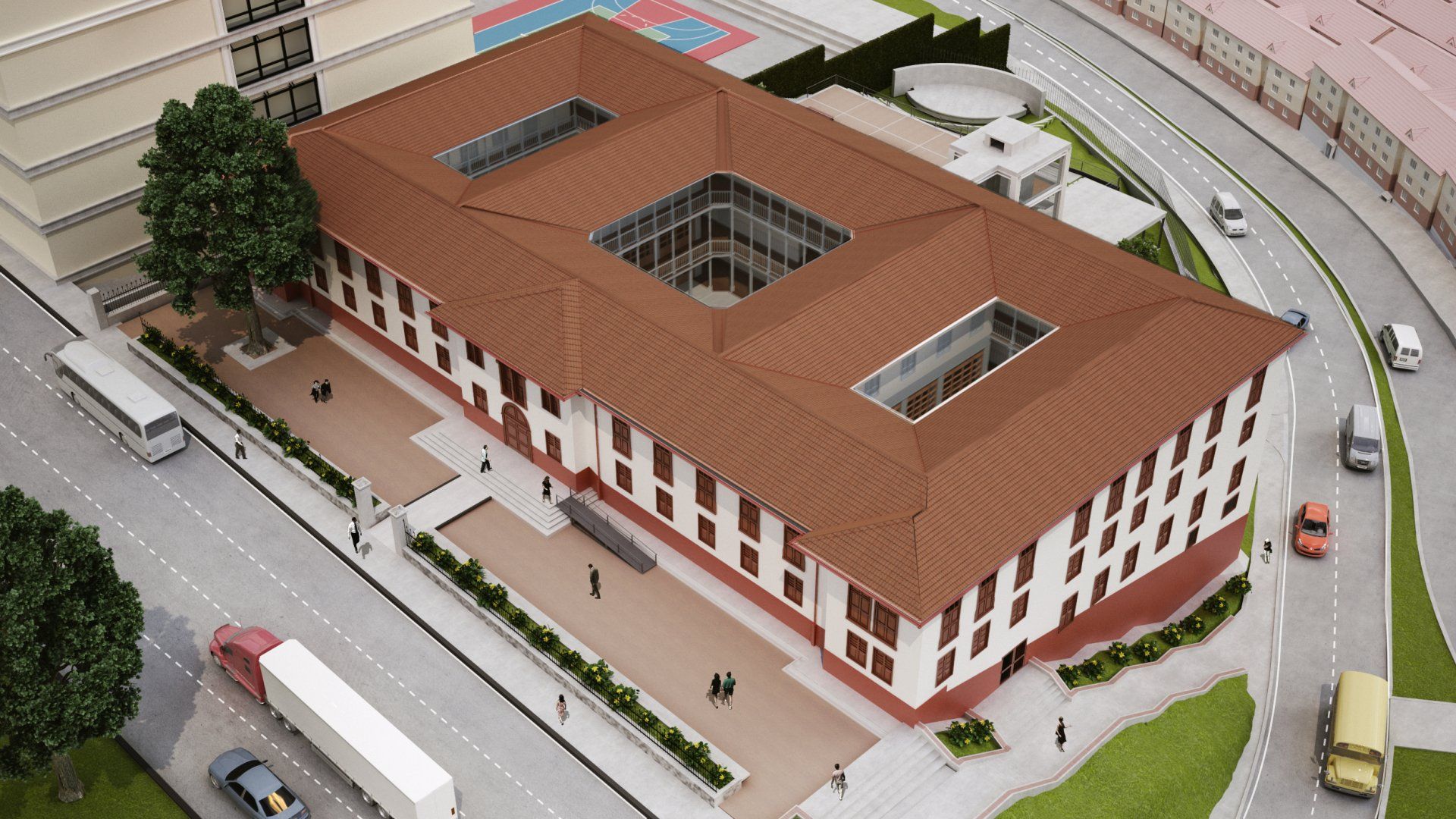 Una vista aérea de un gran edificio con techo rojo