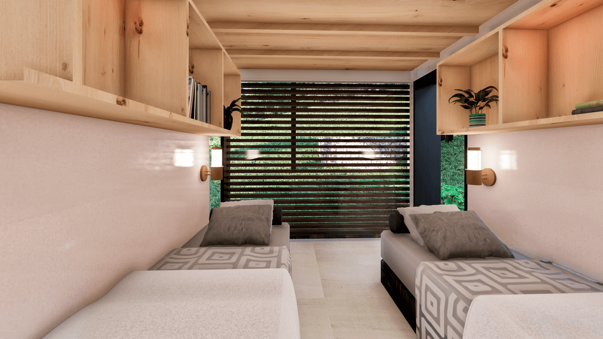 Un dormitorio con dos camas y una ventana.