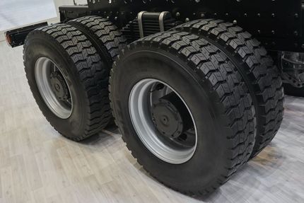 A Close Up of a Truck 's Tires on a Wooden Floor — Turbo's Tyres Pty Ltd In Humpty Doo, NT