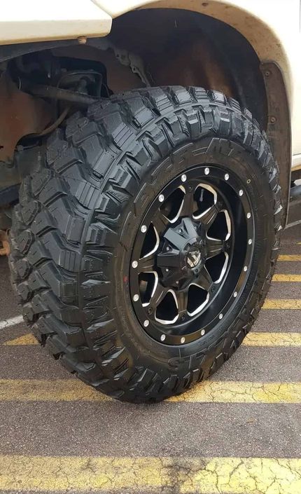A Close Up of a Tire on a Truck in a Parking Lot — Turbo's Tyres Pty Ltd In Humpty Doo, NT