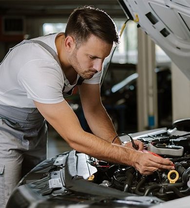 Mechanic Working with Car Diagnostic Tool — New Britain, CT — The Transmission Works