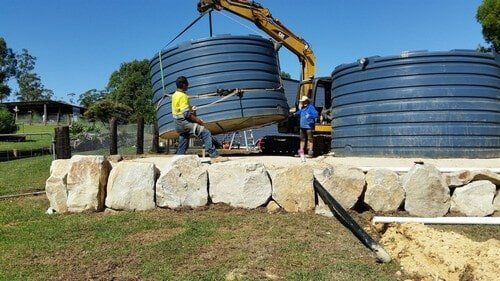 Blue Tanks — Earthmoving Services  in Eungai Creek, NSW