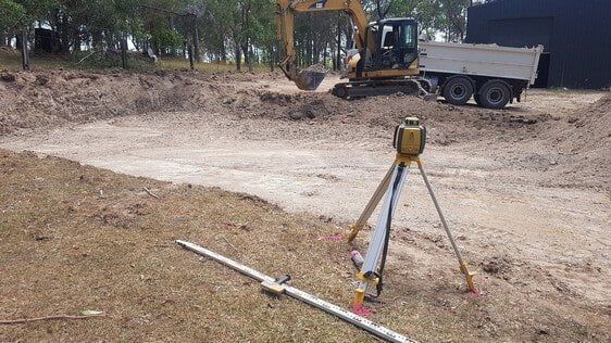Excavator and Truck Earthmoving — Earthmoving Services  in Eungai Creek, NSW