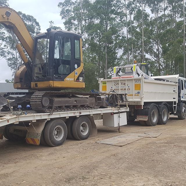 Excavator and Truck — Earthmoving Services  in Eungai Creek, NSW